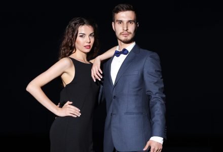 Elegant couple on dark background